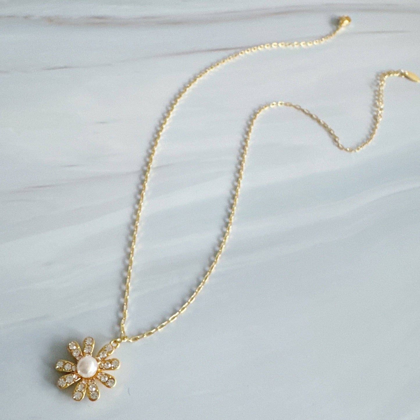 Golden Glow Blossom Necklace – Pearl Center with Shimmering Petals