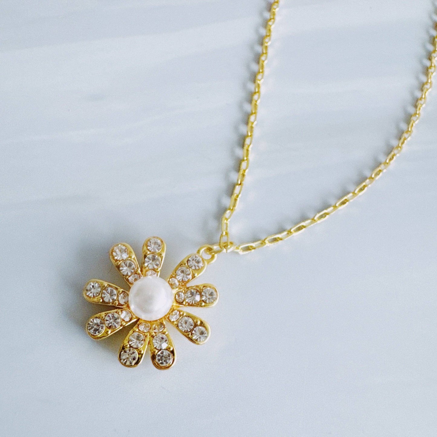 Golden Glow Blossom Necklace – Pearl Center with Shimmering Petals